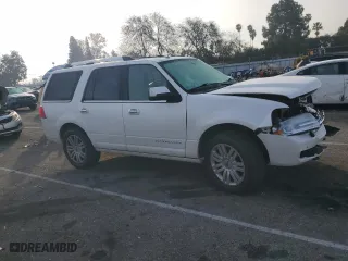 2014 Lincoln Navigator with VIN 5LMJJ2H53EEL05069, listed as a Copart auction lot 43578995 with 129,080 mi miles and Salvage Title. Bid and sale history available at carsss.com. Image 4.