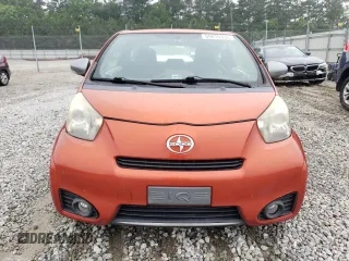 2012 Scion iQ with VIN JTNJJXB07CJ017816, listed as a Copart auction lot 59616355 with 141,384 mi miles and Salvage title. Bid and sale history available at DreamBid. Image 5.