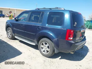 2010 Honda Pilot Touring with VIN 5FNYF3H84AB022700, listed as a IAAI auction lot 41689783 with 170,972 mi miles and . Bid and sale history available at DreamBid. Image 3.