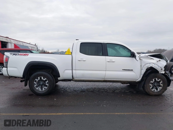 2021 Toyota Tacoma SR5 with VIN 3TMDZ5BN1MM100575, listed as a IAAI auction lot 41516274 with 61,974 mi miles and . Bid and sale history available at DreamBid. Image 14.