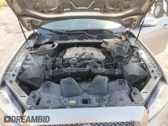2014 Jaguar XJ Portfolio with VIN SAJWJ2GD7E8V61558, listed as a Copart auction lot 66850034 with 130,984 mi miles and Salvage title. Bid and sale history available at DreamBid. Image 13.