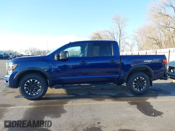 2021 Nissan Titan Pro-4X z VIN 1N6AA1ED1MN517476, wystawiony jako IAAI lot #41422217 z przebiegiem 62 650 mil mil oraz . Historia ofert i sprzedaży dostępna na DreamBid. Obrazek 14.