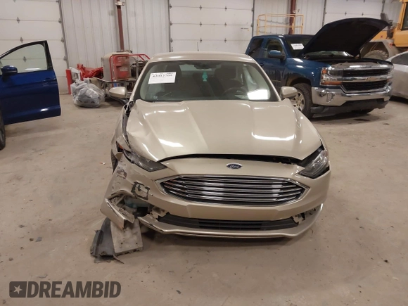 2018 Ford Fusion SE z VIN 3FA6P0HD2JR201693, wystawiony jako IAAI lot #42012709 z przebiegiem 110 857 mil mil oraz . Historia ofert i sprzedaży dostępna na DreamBid. Obrazek 6.