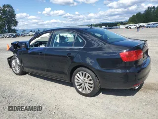 2014 Volkswagen Jetta SEL z VIN 3VWL17AJ2EM390112, wystawiony jako Copart lot #58094365 z przebiegiem Nie podano mil oraz Czysty tytuł • Clean title. Historia ofert i sprzedaży dostępna na DreamBid. Obrazek 2.