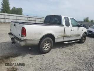 1998 Ford F-150 with VIN 2FTZX1766WCA27840, listed as a Copart auction lot 56186495 with 147,127 mi miles and Clean title. Bid and sale history available at DreamBid. Image 3.