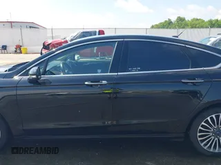 2017 Ford Fusion SE with VIN 3FA6P0T94HR321704, listed as a IAAI auction lot 42253691 with 129,115 mi miles and . Bid and sale history available at DreamBid. Image 14.