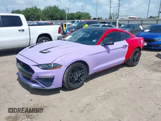 2021 Ford Mustang EcoBoost with VIN 1FA6P8TH2M5101061, listed as a IAAI auction lot 42546464 with 90,592 mi miles and . Bid and sale history available at DreamBid. Image 2.