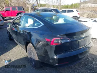2019 Tesla Model 3 Mid Range z VIN 5YJ3E1EA4KF317872, wystawiony jako IAAI lot #41491269 z przebiegiem 90 772 mil mil oraz . Historia ofert i sprzedaży dostępna na DreamBid. Obrazek 3.