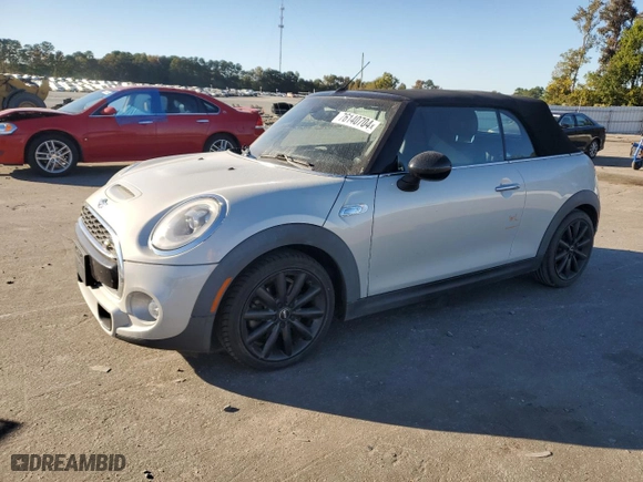 2016 MINI Cooper Convertible S with VIN WMWWG9C50G3C22502, listed as a Copart auction lot 76140704 with 60,221 mi miles and Salvage Title. Bid and sale history available at carsss.com. Image 1.