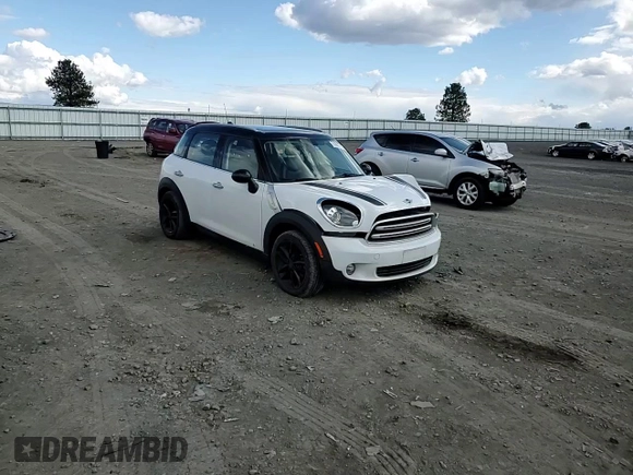 2015 MINI Countryman with VIN WMWZB3C50FWR44801, listed as a Copart auction lot 51957715 with 69,537 mi miles and Salvage Title. Bid and sale history available at DreamBid. Image 10.