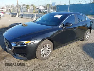2024 Mazda 3 S with VIN 3MZBPAAMXRM423154, listed as a IAAI auction lot 41969779 with 3,046 mi miles and . Bid and sale history available at DreamBid. Image 2.