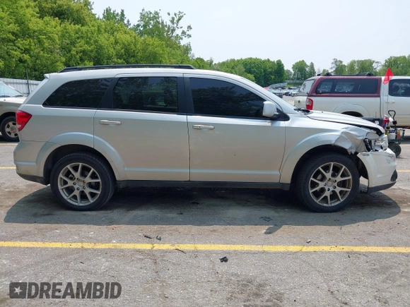 2012 Dodge Journey SXT with VIN 3C4PDDBG1CT249368, listed as a IAAI auction lot 42412217 with 151,680 mi miles and . Bid and sale history available at DreamBid. Image 14.