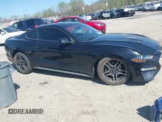 2019 Ford Mustang EcoBoost z VIN 1FA6P8TH5K5185938, wystawiony jako IAAI lot #41999077 z przebiegiem 99 254 mil mil oraz . Historia ofert i sprzedaży dostępna na DreamBid. Obrazek 1.