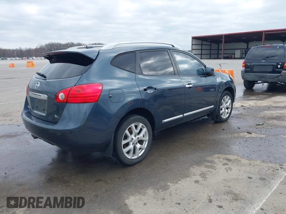 2013 Nissan Rogue S with VIN JN8AS5MT1DW507934, listed as a IAAI auction lot 41934593 with 138,508 mi miles and . Bid and sale history available at DreamBid. Image 4.