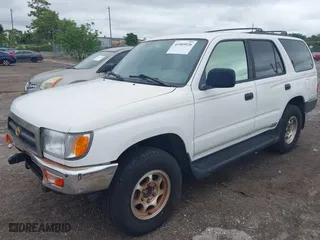 1998 Toyota 4Runner with VIN JT3GM84R5W0031171, listed as a IAAI auction lot 41989920 with 163,296 mi miles. Bid and sale history available at carsss.com. Image 2.
