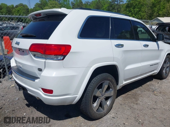 2015 Jeep Grand Cherokee Overland with VIN 1C4RJECG6FC707458, listed as a IAAI auction lot 41996350 with 128,307 mi miles and . Bid and sale history available at DreamBid. Image 4.