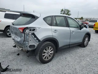 2016 Mazda CX-5 Sport with VIN JM3KE4BY1G0799275, listed as a Copart auction lot 51202355 with 98,409 mi miles and Non Repairable. Bid and sale history available at carsss.com. Image 3.