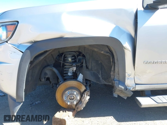 2019 Chevrolet Colorado 4WD Z71 z VIN 1GCGTDEN2K1146043, wystawiony jako IAAI lot #41712002 z przebiegiem 84 034 mil mil oraz . Historia ofert i sprzedaży dostępna na DreamBid. Obrazek 6.