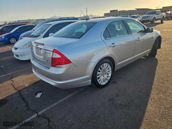2011 Ford Fusion Hybrid with VIN 3FADP0L36BR251407, listed as a Copart auction lot 85387764 with 129,972 mi miles and Clean Title. Bid and sale history available at carsss.com. Image 4.