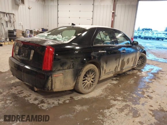 2010 Cadillac STS AWD with VIN 1G6DU6EV2A0125065, listed as a IAAI auction lot 41229886 with 84,954 mi miles and . Bid and sale history available at DreamBid. Image 4.