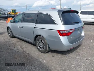 2012 Honda Odyssey EX-L with VIN 5FNRL5H68CB131431, listed as a IAAI auction lot 42012749 with 245,649 mi miles and . Bid and sale history available at carsss.com. Image 3.