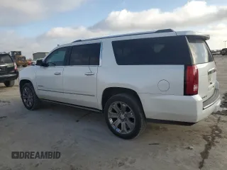 2016 GMC Yukon XL Denali with VIN 1GKS2HKJXGR220635, listed as a Copart auction lot 48920655 with 113,924 mi miles and Salvage Title. Bid and sale history available at DreamBid. Image 2.