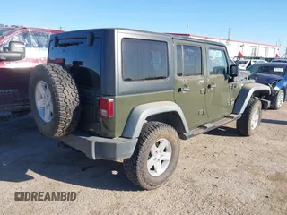 2015 Jeep Wrangler Unlimited Sport with VIN 1C4BJWDG5FL745673, listed as a IAAI auction lot 41681043 with 97,605 mi miles and . Bid and sale history available at DreamBid. Image 4.