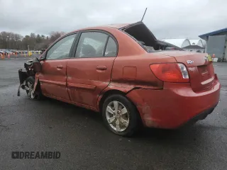 2010 Kia Rio LX with VIN KNADH4A39A6598630, listed as a Copart auction lot 51523545 with 99,896 mi miles and Non Repairable. Bid and sale history available at carsss.com. Image 2.