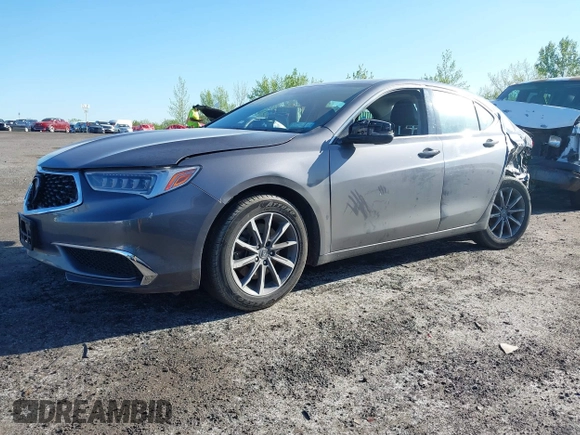 2018 Acura TLX with VIN 19UUB1F31JA011086, listed as a IAAI auction lot 42125299 with 115,171 mi miles and . Bid and sale history available at DreamBid. Image 2.