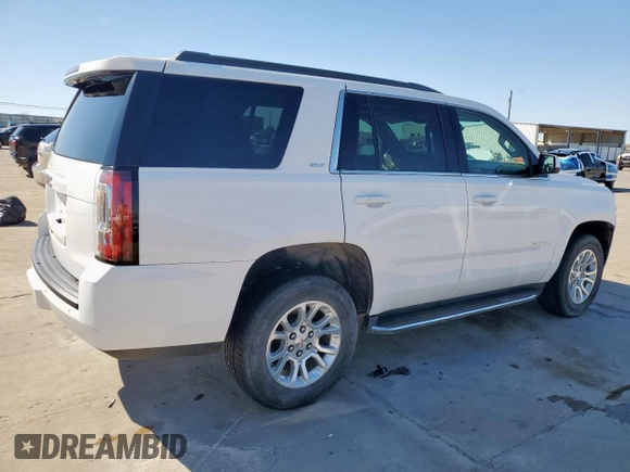 2020 GMC Yukon SLT with VIN 1GKS2BKCXLR215461, listed as a Copart auction lot 48857795 with 94,307 mi miles and Salvage Title. Bid and sale history available at carsss.com. Image 3.