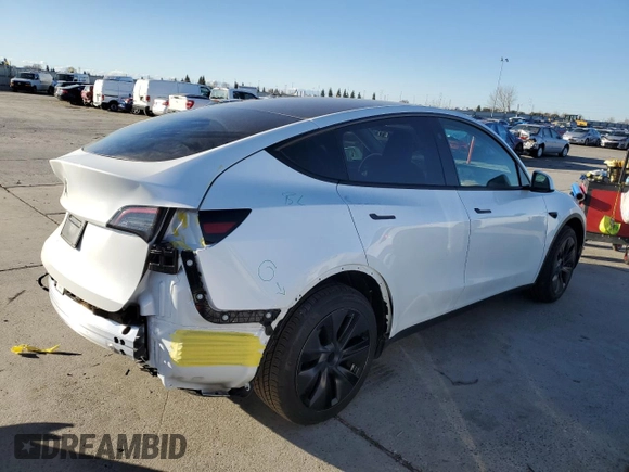 2025 Tesla Model Y Long Range with VIN 7SAYGDEDXSF228371, listed as a Copart auction lot 43925575 with 2,848 mi miles and Salvage Title. Bid and sale history available at DreamBid. Image 3.