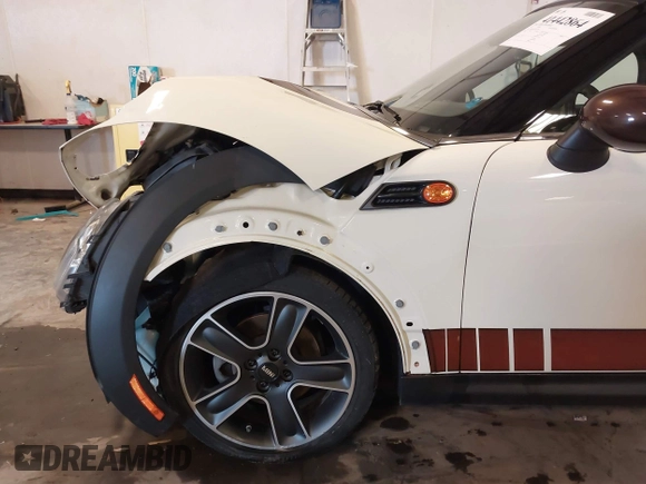 2013 MINI Roadster with VIN WMWSY1C52DT625564, listed as a IAAI auction lot 41442864 with 98,240 mi miles and . Bid and sale history available at DreamBid. Image 18.