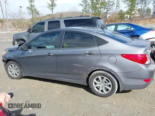 2014 Hyundai Accent GLS with VIN KMHCT4AEXEU710606, listed as a IAAI auction lot 41764163 with 103,859 mi miles. Bid and sale history available at carsss.com. Image 14.