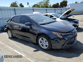 2022 Toyota Corolla Hatchback SE with VIN JTND4MBEXN3186220, listed as a Copart auction lot 63149424 with 15,331 mi miles and Salvage Title. Bid and sale history available at carsss.com. Image 4.