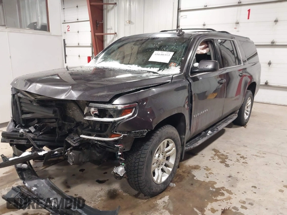 2018 Chevrolet Suburban LT z VIN 1GNSKHKC7JR173463, wystawiony jako IAAI lot #41640353 z przebiegiem Nie podano mil oraz . Historia ofert i sprzedaży dostępna na DreamBid. Obrazek 17.