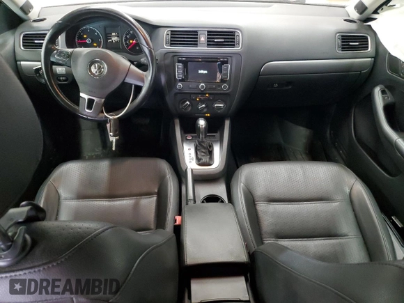 2014 Volkswagen Jetta TDI w/Premium with VIN 3VWLL7AJ9EM261908, listed as a Copart auction lot 60703205 with 128,892 mi miles and Salvage title. Bid and sale history available at DreamBid. Image 8.