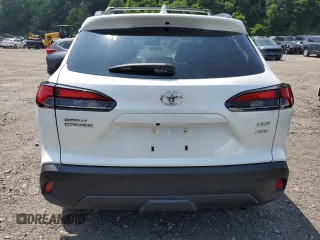 2023 Toyota Corolla Cross XLE with VIN 7MUDAABGXPV060797, listed as a Copart auction lot 62110665 with 18,293 mi miles and Salvage title. Bid and sale history available at DreamBid. Image 6.
