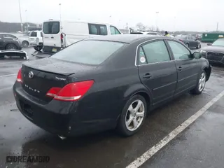 2007 Toyota Avalon XL with VIN 4T1BK36B67U225972, listed as a IAAI auction lot 41475853 with 206,261 mi miles. Bid and sale history available at carsss.com. Image 4.