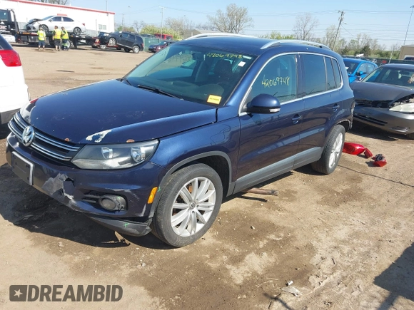 2012 Volkswagen Tiguan S with VIN WVGBV7AX2CW566981, listed as a IAAI auction lot 42069748 with 153,613 mi miles and . Bid and sale history available at DreamBid. Image 19.