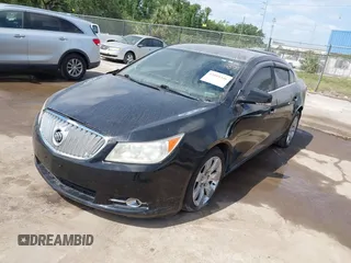 2011 Buick LaCrosse CXL with VIN 1G4GC5EDXBF357292, listed as a IAAI auction lot 42019346 with 153,107 mi miles. Bid and sale history available at carsss.com. Image 2.