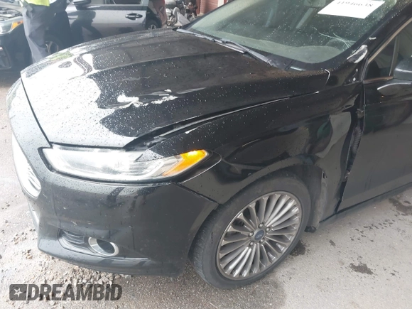 2014 Ford Fusion Titanium with VIN 3FA6P0K99ER235785, listed as a IAAI auction lot 41946638 with 212,939 mi miles and . Bid and sale history available at DreamBid. Image 6.