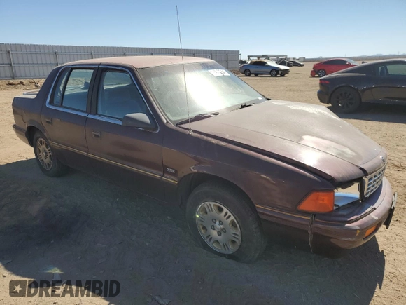1993 Plymouth Acclaim z VIN 1P3XA4630PF630239, wystawiony jako Copart lot #75910954 z przebiegiem 87 471 mil mil oraz Czysty tytuł • Clean title. Historia ofert i sprzedaży dostępna na DreamBid. Obrazek 4.
