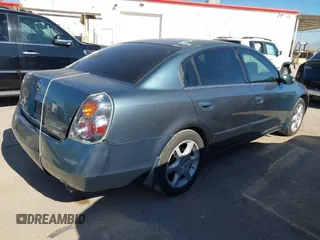 2002 Nissan Altima SE with VIN 1N4BL11D72C700998, listed as a IAAI auction lot 41369017 with 117,148 mi miles. Bid and sale history available at carsss.com. Image 4.