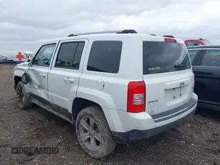 2016 Jeep Patriot High Altitude Edition with VIN 1C4NJRFB9GD808902, listed as a IAAI auction lot 41919059 with 123,265 mi miles. Bid and sale history available at carsss.com. Image 3.