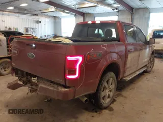 2016 Ford F-150 XLT with VIN 1FTEW1EF3GFC70144, listed as a IAAI auction lot 41448079 with 123,692 mi miles. Bid and sale history available at carsss.com. Image 4.