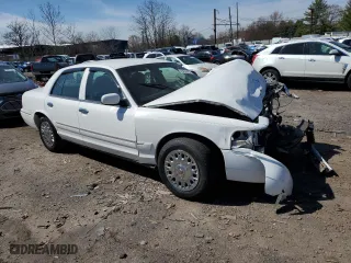 2004 Mercury Grand Marquis GS with VIN 2MEFM74W64X610707, listed as a Copart auction lot 49430335 with 98,719 mi miles and Salvage Title. Bid and sale history available at carsss.com. Image 4.