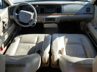 2005 Ford Crown Victoria LX z VIN 2FAFP74WX5X166506, wystawiony jako Copart lot #52141265 z przebiegiem 117 686 mil mil oraz Szkoda całkowita • Salvage title. Historia ofert i sprzedaży dostępna na DreamBid. Obrazek 8.
