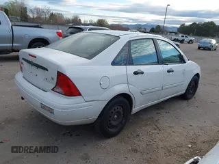 2004 Ford Focus SE with VIN 1FAFP34394W199845, listed as a IAAI auction lot 41896239 with 98,464 mi miles and . Bid and sale history available at DreamBid. Image 4.