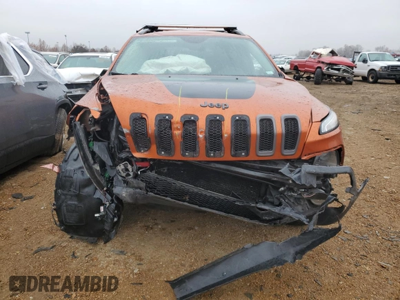 2015 Jeep Cherokee Trailhawk z VIN 1C4PJMBS7FW704980, wystawiony jako Copart lot #70334472 z przebiegiem 127 562 mil mil oraz Szkoda całkowita • Salvage title. Historia ofert i sprzedaży dostępna na DreamBid. Obrazek 5.