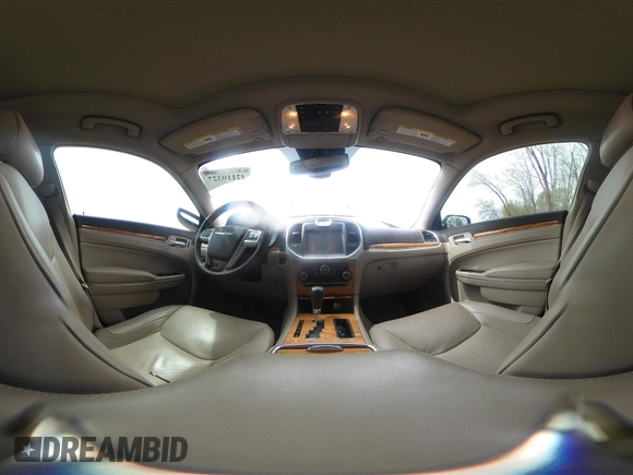 2012 Chrysler 300 C with VIN 2C3CCAKTXCH220185, listed as a IAAI auction lot 42110327 with 57,682 mi miles and . Bid and sale history available at DreamBid. Image 20.